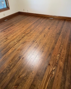 refinished hardwood floors in an empty room