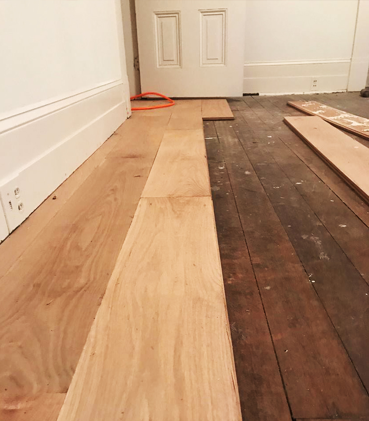 Hardwood floor installation in progress